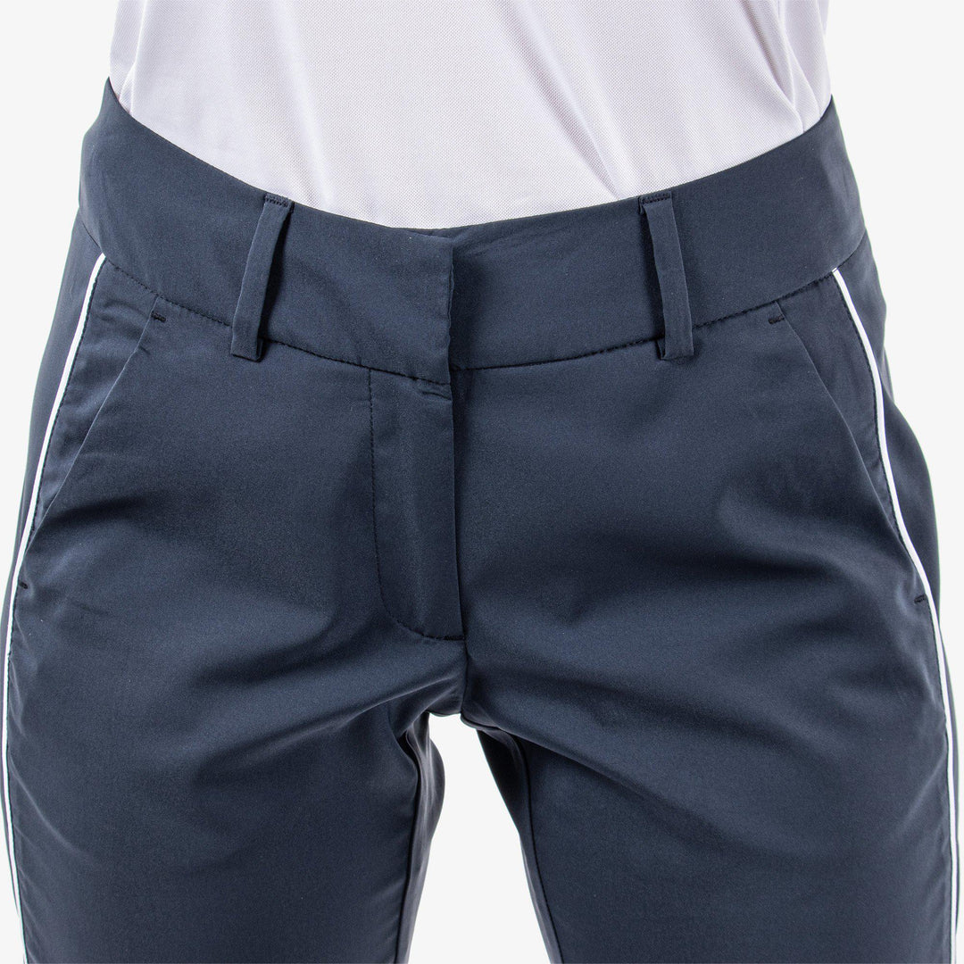 Nicole is a Breathable pants for  in the color Navy/White(4)