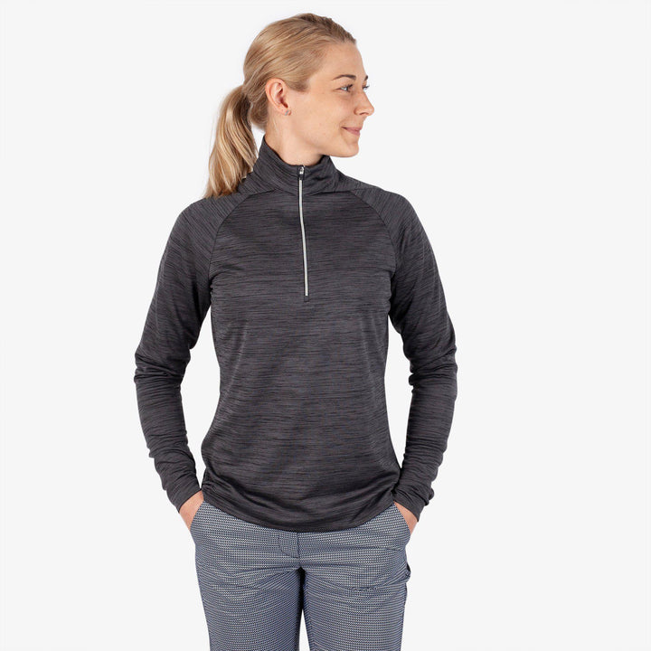 Dina is a Insulating golf mid layer for Women in the color Black(1)