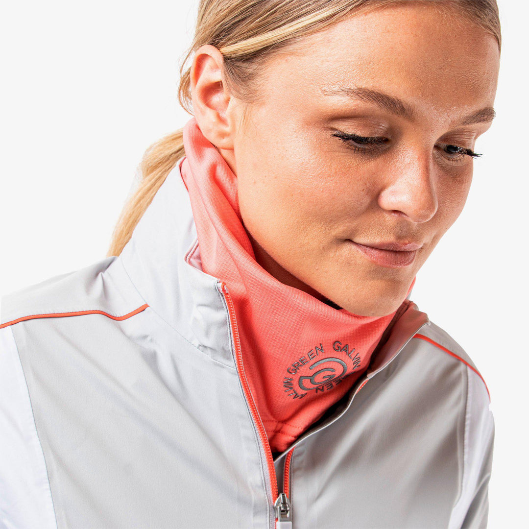 Dex is a Insulating golf neck warmer in the color Coral(4)