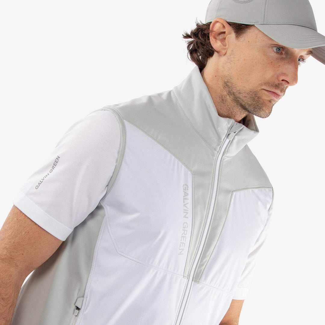 Lathan is a Windproof and water repellent vest for  in the color White/Cool Grey(3)