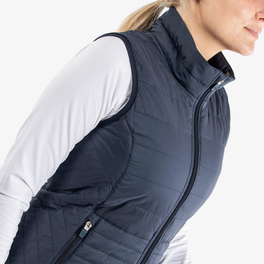 Lene is a Windproof and water repellent vest for  in the color Navy(3)