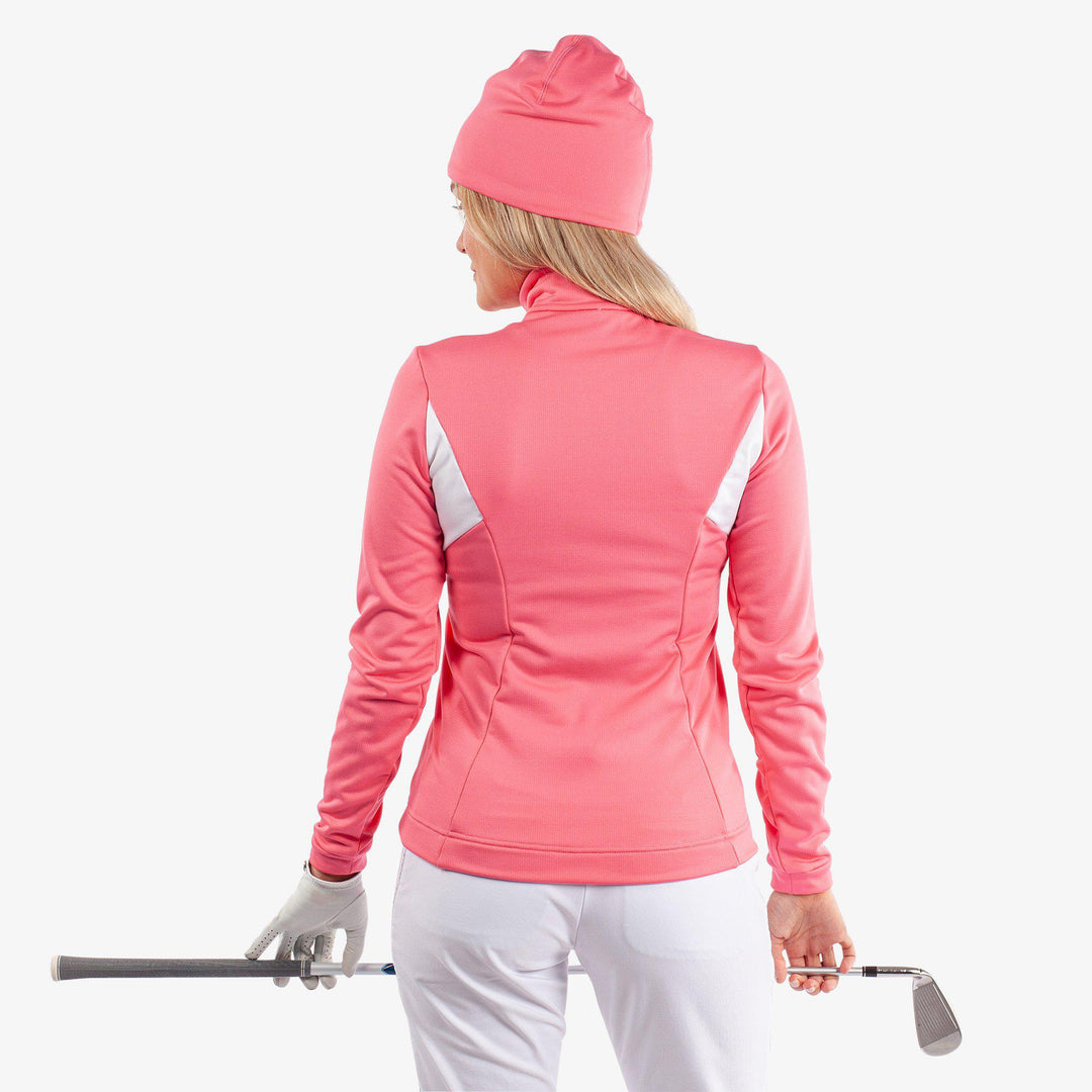 Destiny is a Insulating golf mid layer for Women in the color Camelia Rose/White(4)