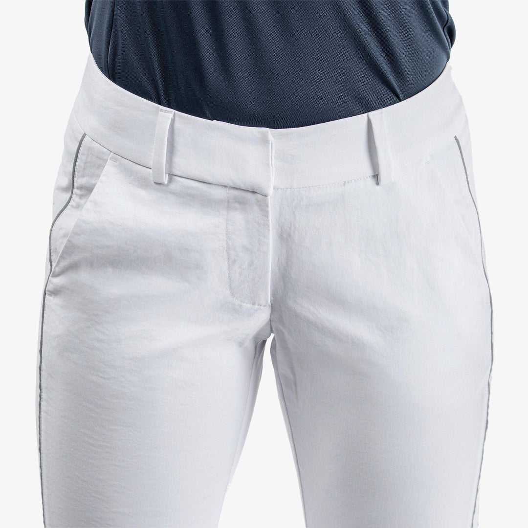 Nicole is a Breathable golf pants for Women in the color White/Cool Grey(4)