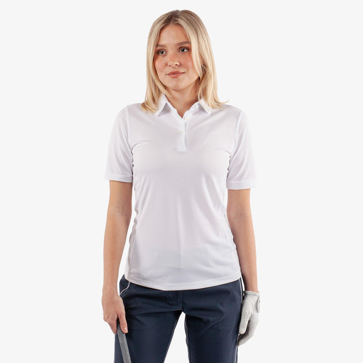 Melody is a Breathable short sleeve golf shirt for Women in the color White(1)