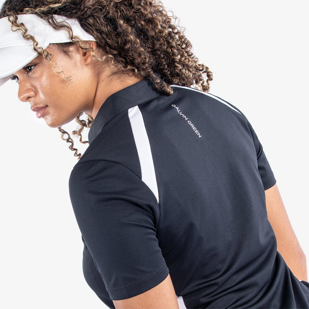 Mirelle is a Breathable short sleeve golf shirt for Women in the color Black/White(5)