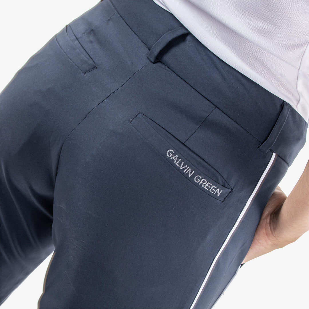 Nicole is a Breathable pants for  in the color Navy/White(6)