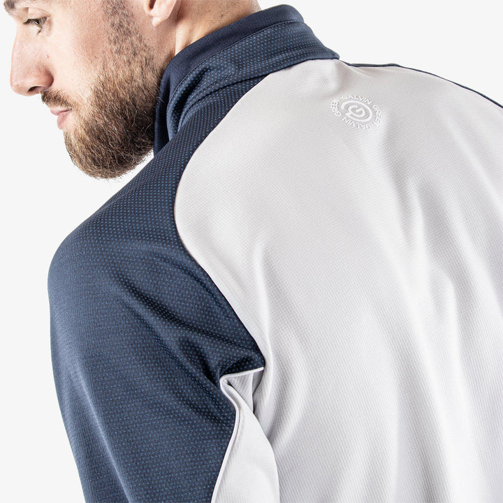 Daxton is a Insulating golf mid layer for Men in the color Navy/Cool Grey/White(5)