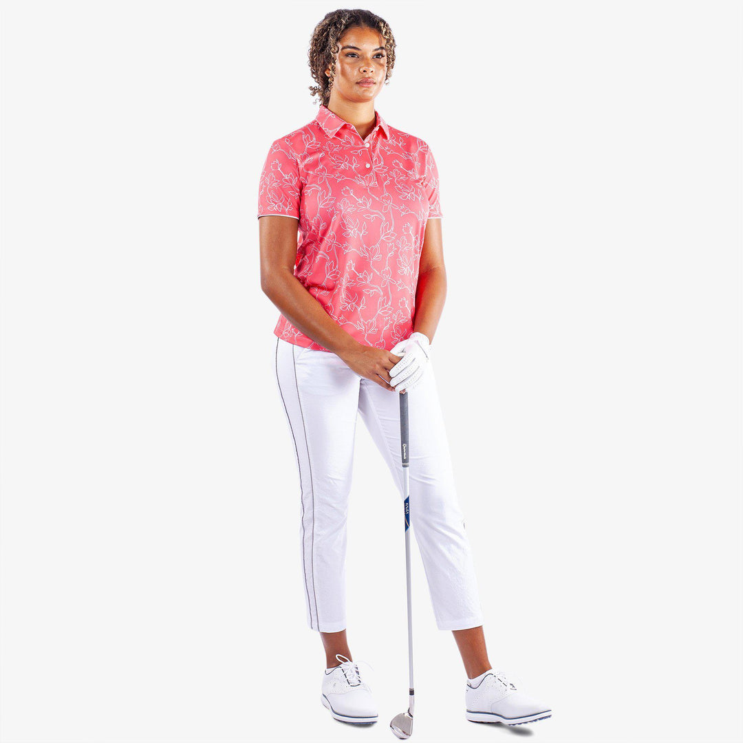 Mallory is a Breathable short sleeve golf shirt for Women in the color Camelia Rose/White(2)