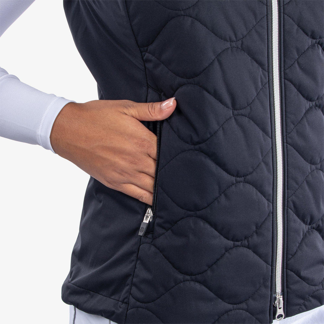 Lucille is a Windproof and water repellent vest for  in the color Black(4)
