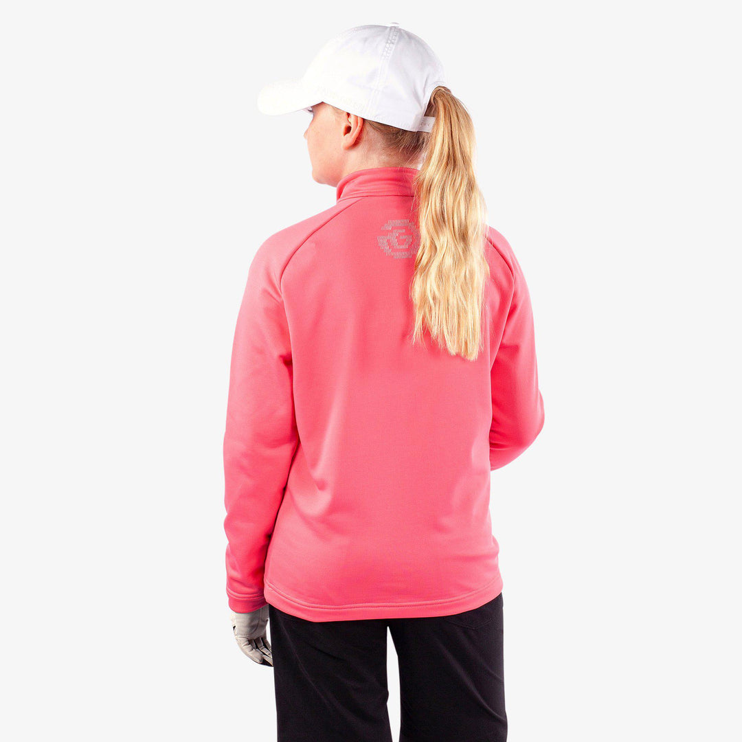 Raz is a Insulating golf mid layer for Juniors in the color Camelia Rose(4)