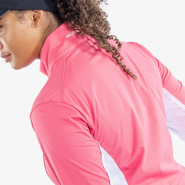 Larissa is a Windproof and water repellent golf jacket for Women in the color Camelia Rose/White(6)