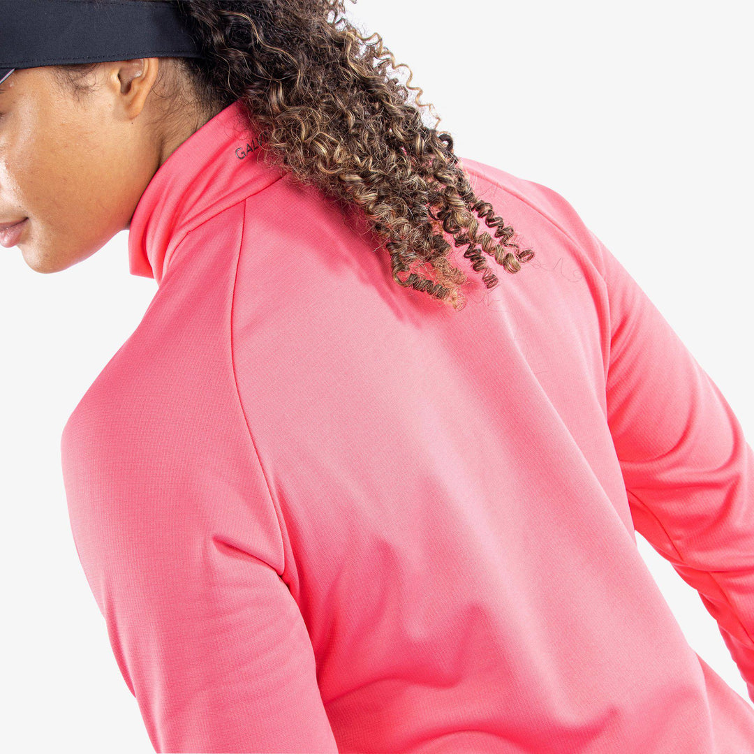 Dolly is a Insulating golf mid layer for Women in the color Camelia Rose(4)