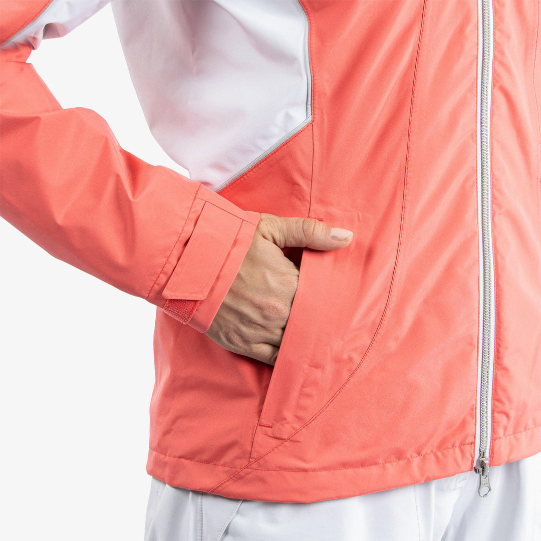 Aida is a Waterproof jacket for  in the color Coral/White/Cool Grey(5)