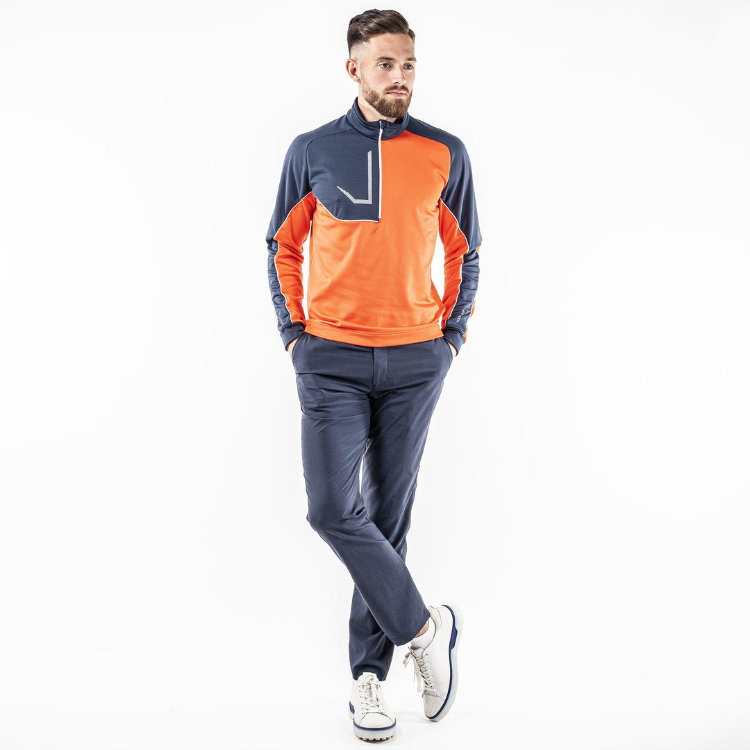 Daxton is a Insulating golf mid layer for Men in the color Orange(2)