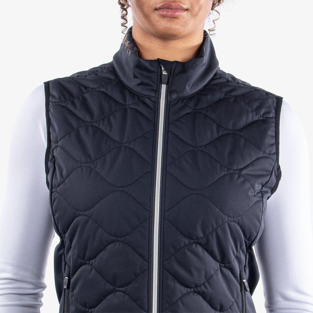 Lucille is a Windproof and water repellent vest for  in the color Black(3)
