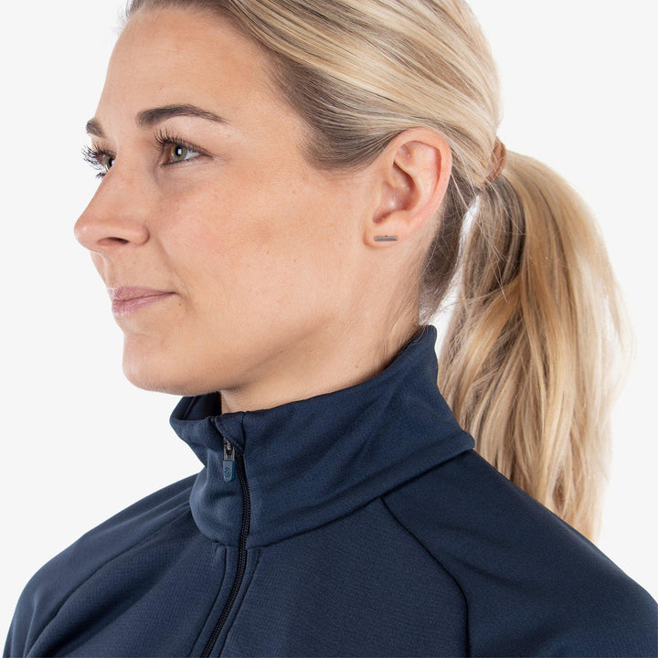 Dolly is a Insulating golf mid layer for Women in the color Navy(3)