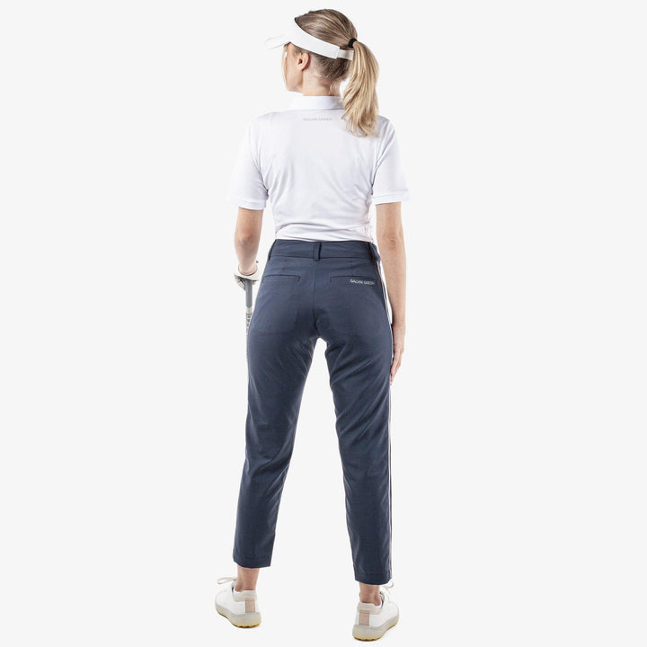 Nicole is a Breathable pants for  in the color Navy/White(7)