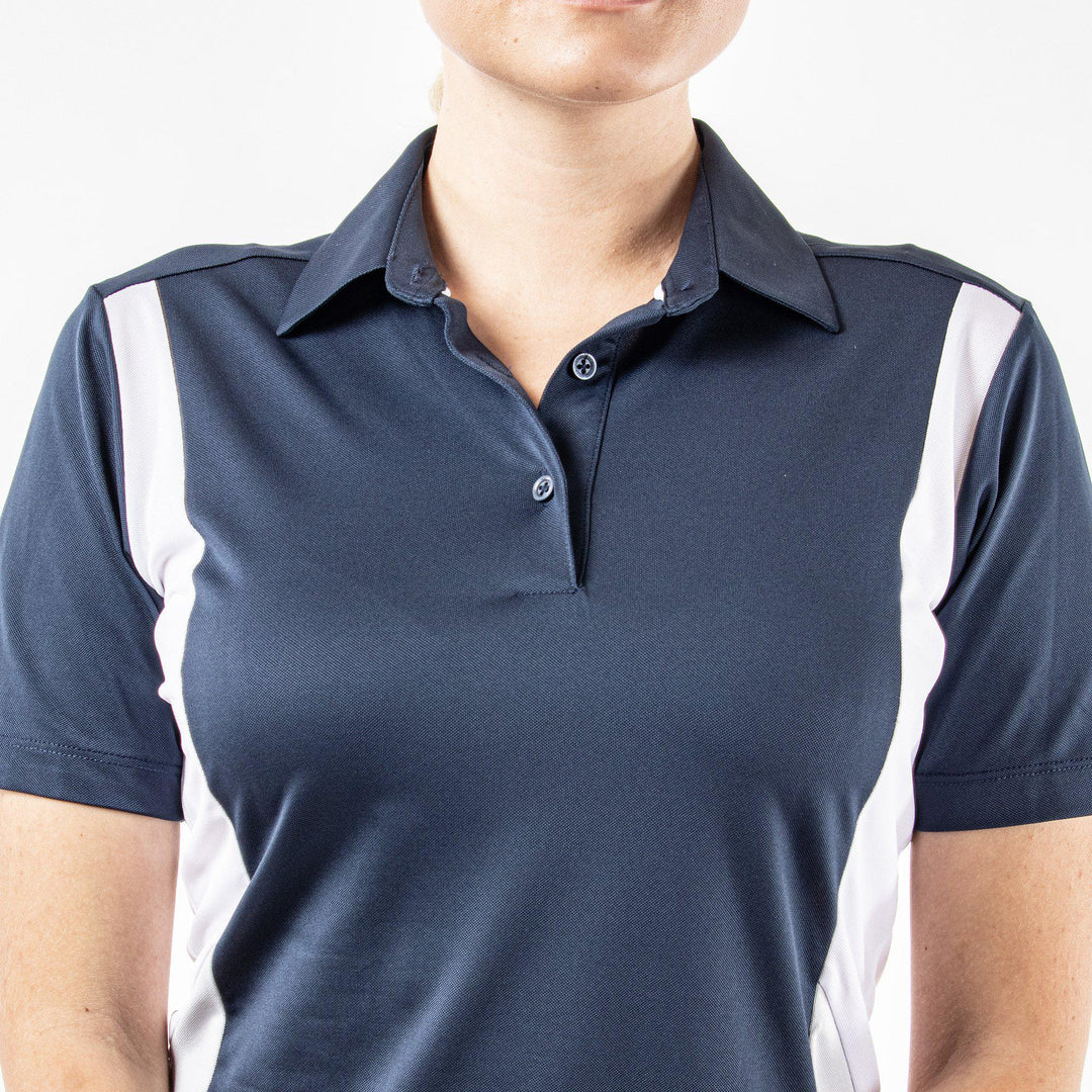 Melanie is a Breathable short sleeve golf shirt for Women in the color Navy/White/Cool Grey(3)