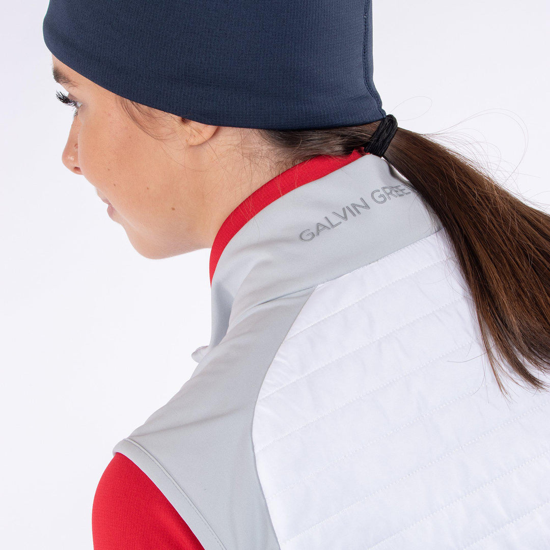 Lisa is a Windproof and water repellent golf vest for Women in the color White base(6)