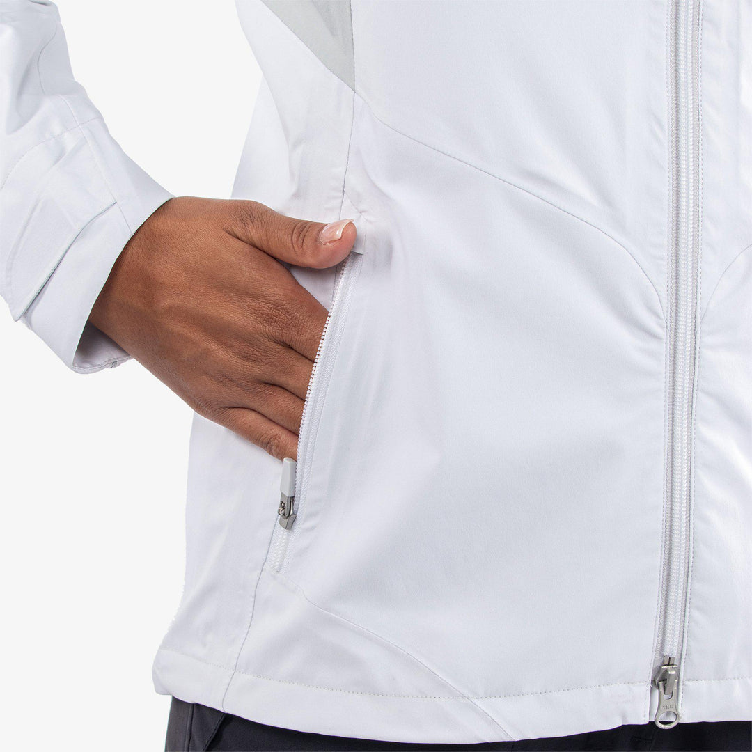 Ally is a Waterproof Jacket for Women in the color White/Cool Grey(4)