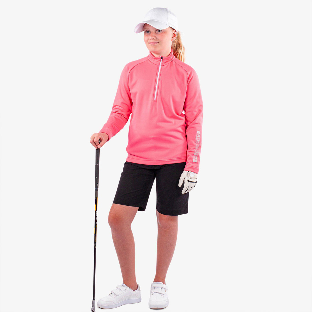Raz is a Insulating golf mid layer for Juniors in the color Camelia Rose(2)