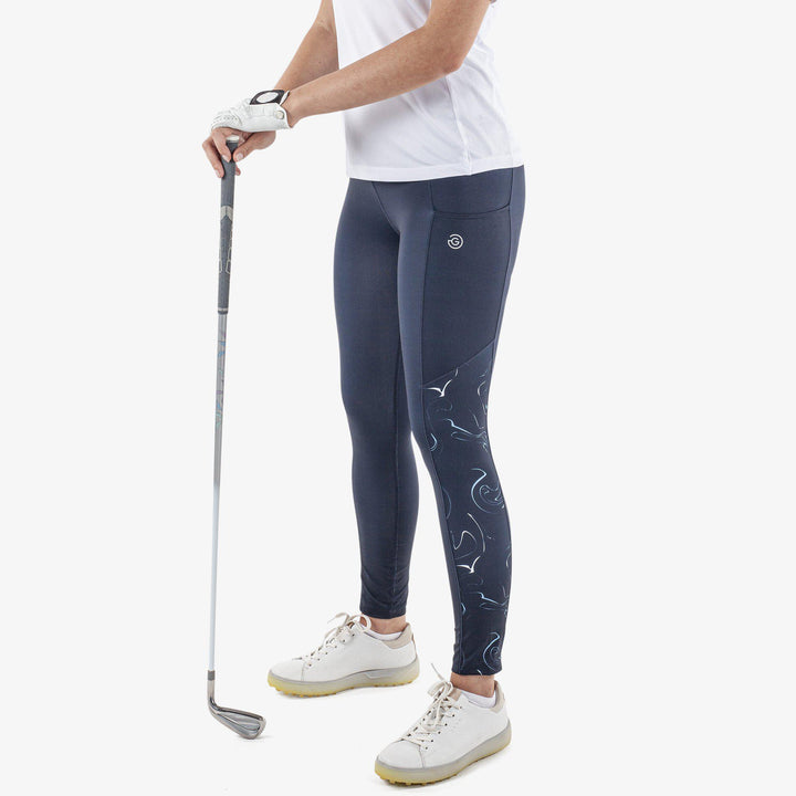 Nicci is a Breathable and stretchy golf leggings for Women in the color Navy(1)