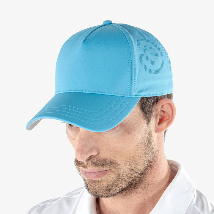 Sanford is a Lightweight solid golf cap in the color Alaskan Blue(2)