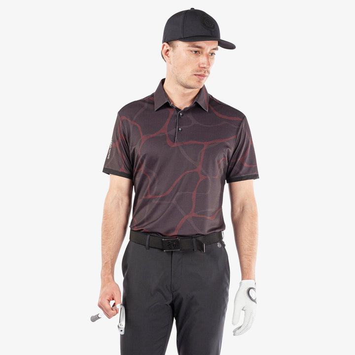 Markos is a Breathable short sleeve golf shirt for Men in the color Black/Red(1)