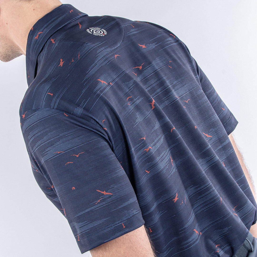 Marin is a Breathable short sleeve shirt for  in the color Navy/Orange(6)