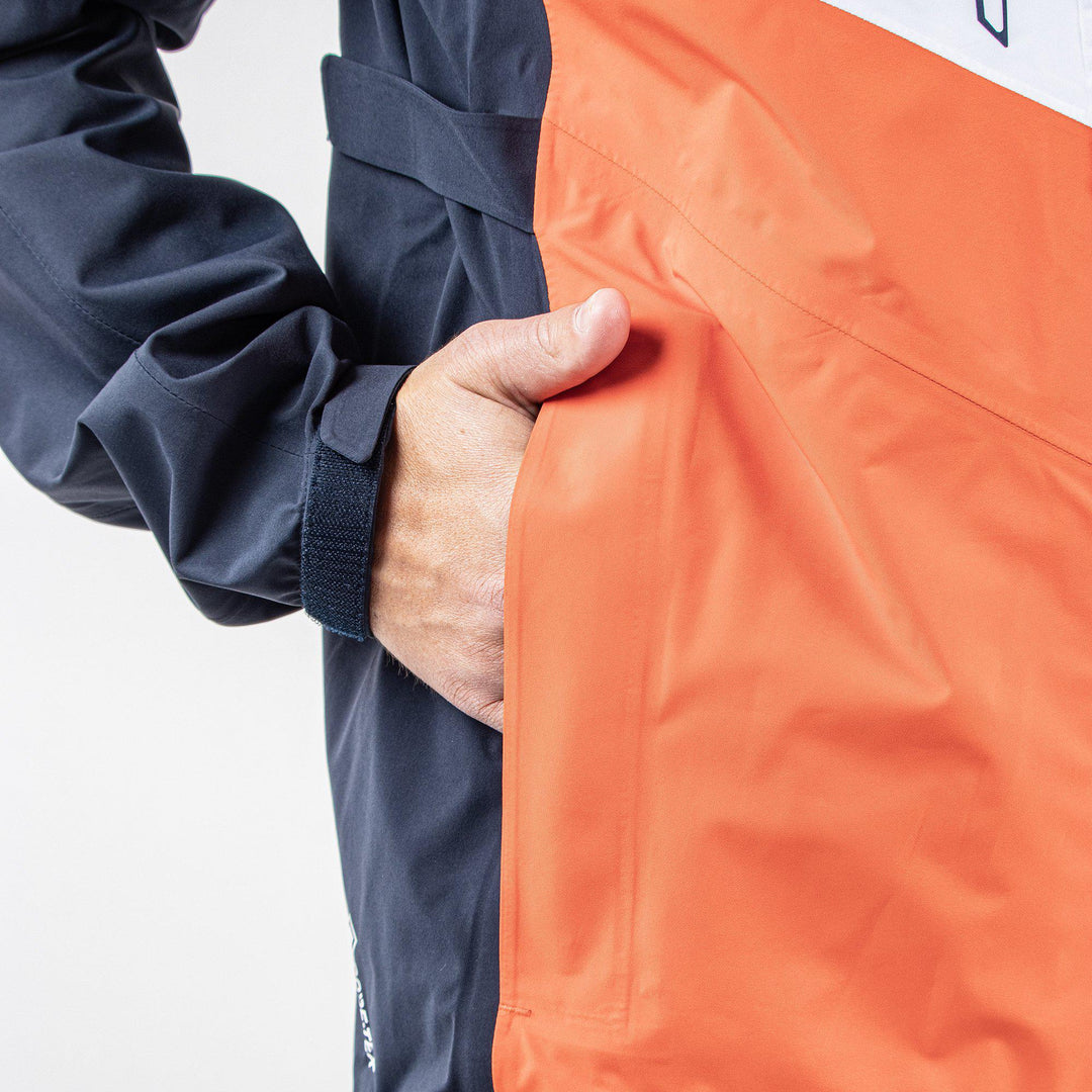Armstrong is a Waterproof jacket for  in the color Navy/White/Orange (5)