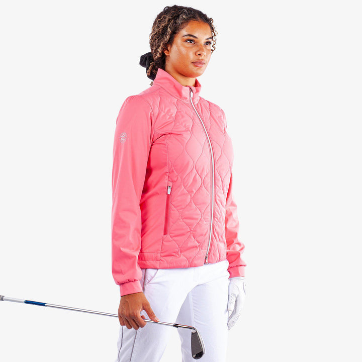 Leora is a Windproof and water repellent golf jacket for Women in the color Camelia Rose(1)