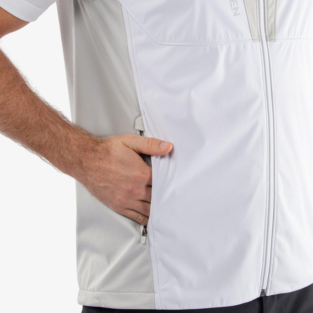 Lathan is a Windproof and water repellent golf vest for Men in the color White/Cool Grey(4)