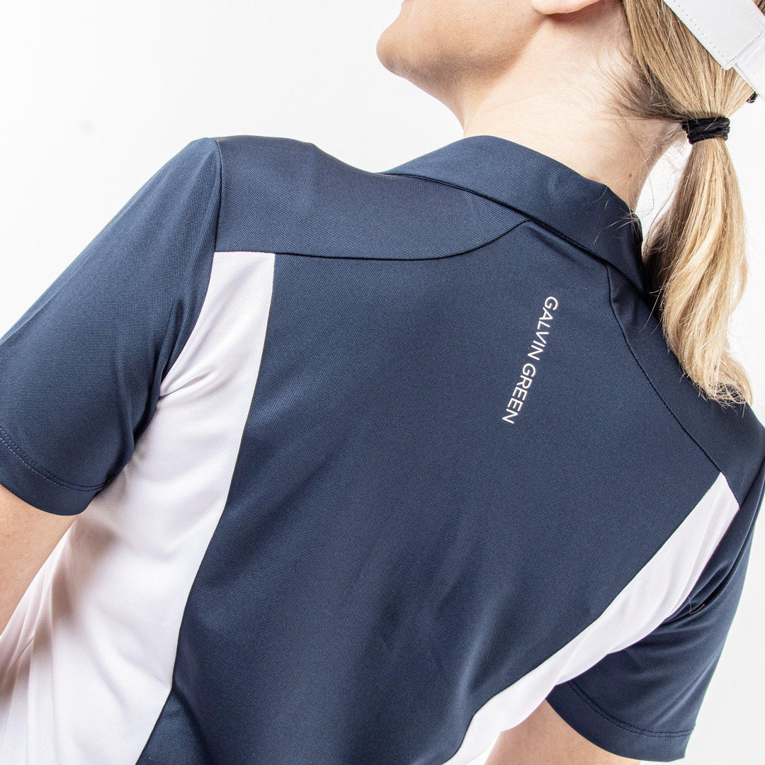 Melanie is a Breathable short sleeve golf shirt for Women in the color Navy/White/Cool Grey(6)