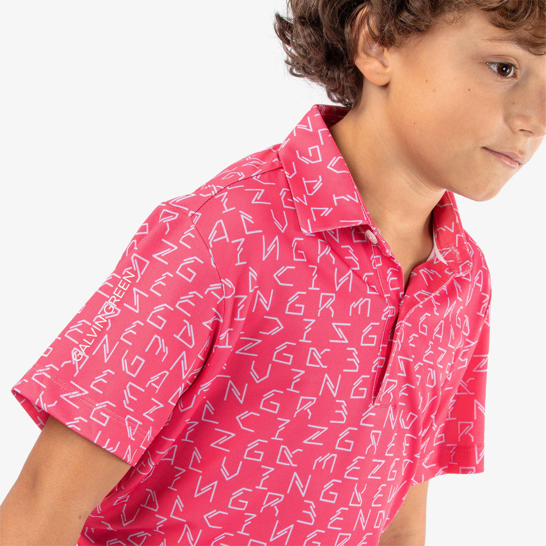 Rickie is a Breathable short sleeve golf shirt for Juniors in the color Camelia Rose(5)
