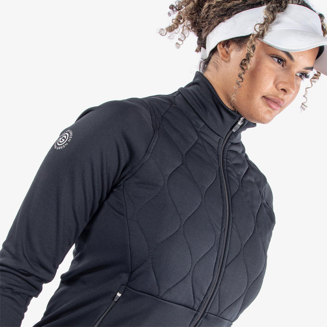 Darlena is a Insulating golf mid layer for Women in the color Black(3)