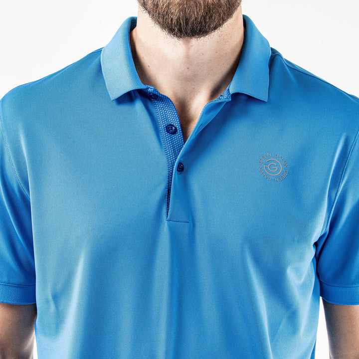 Max Tour is a Breathable short sleeve golf shirt for Men in the color Blue(6)