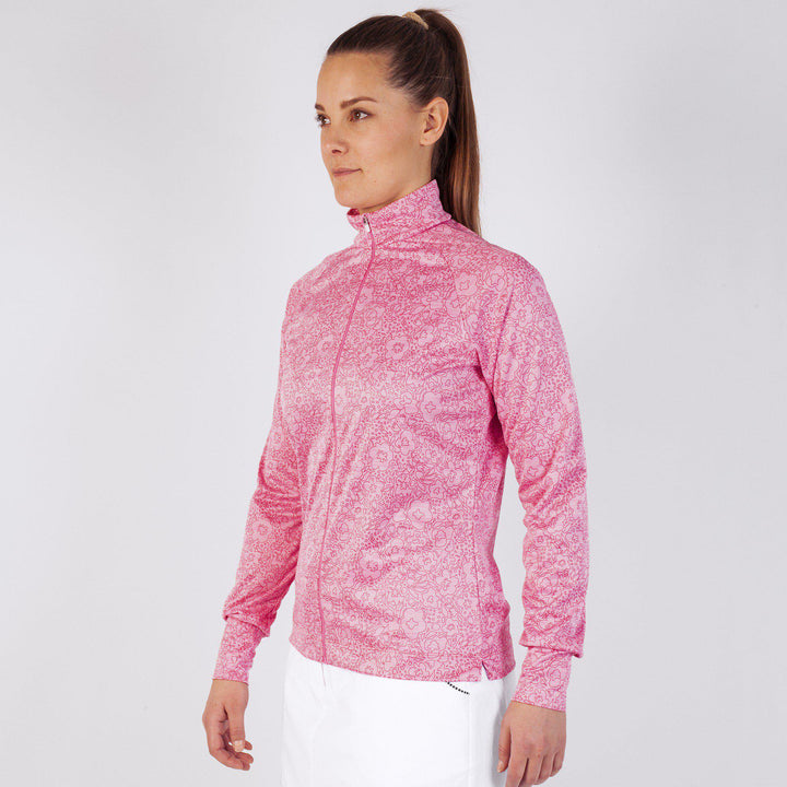 Dixy is a Insulating mid layer for Women in the color Sugar Coral(1)