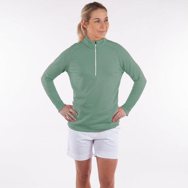 Dolly Upcycled is a Insulating mid layer for Women in the color Golf Green(3)