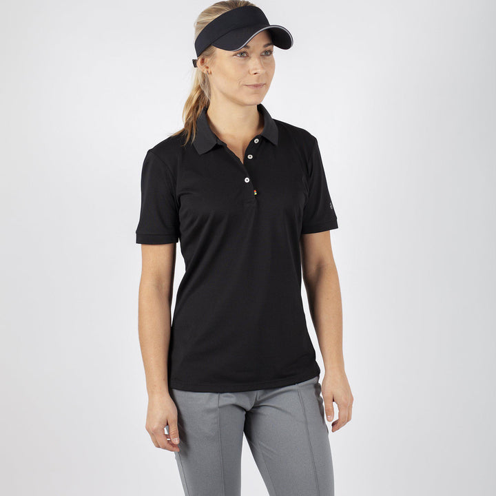 Mireya is a Breathable short sleeve shirt for Women in the color Black(1)