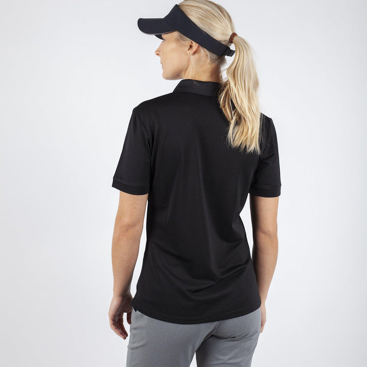 Mireya is a Breathable short sleeve shirt for Women in the color Black(3)