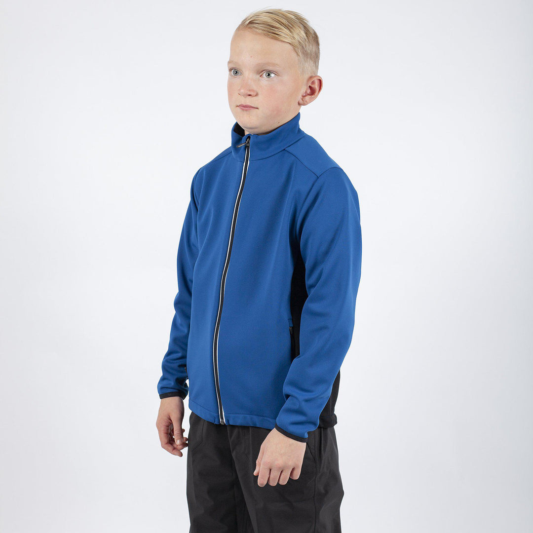 Ridley is a Windproof and water repellent jacket for Juniors in the color Blue Bell(1)