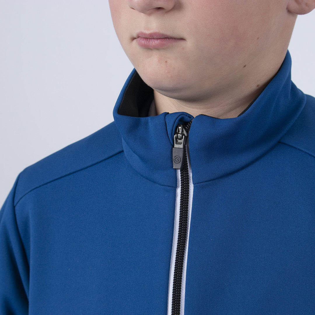 Ridley is a Windproof and water repellent jacket for Juniors in the color Blue Bell(3)