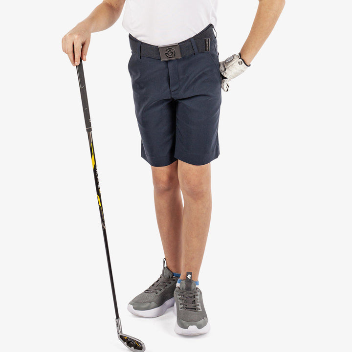 Raul is a Breathable golf shorts for Juniors in the color Navy(1)