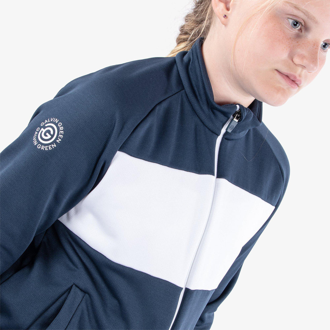 Rex is a Insulating golf mid layer for Juniors in the color Navy/White(3)