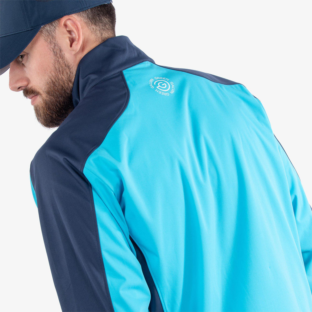 Lawrence is a Windproof and water repellent golf jacket for Men in the color Aqua/Navy(5)