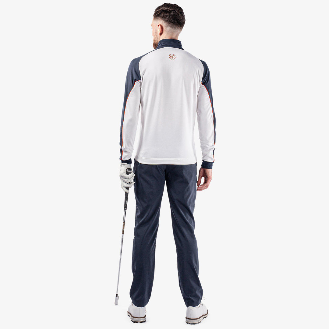 Daxton is a Insulating golf mid layer for Men in the color White/Navy/Orange(8)