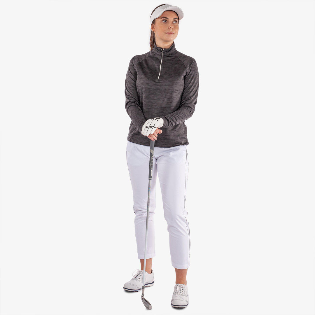 Dina is a Insulating golf mid layer for Women in the color Black(2)