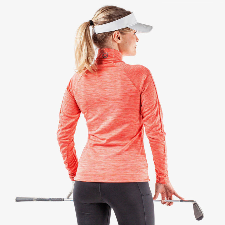 Dina is a Insulating golf mid layer for Women in the color Coral(5)