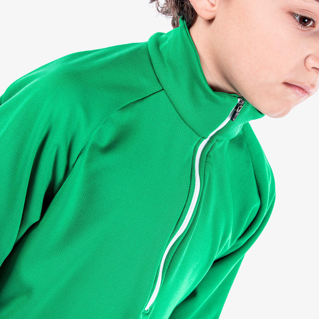 Raz is a Insulating golf mid layer for Juniors in the color Golf Green(3)