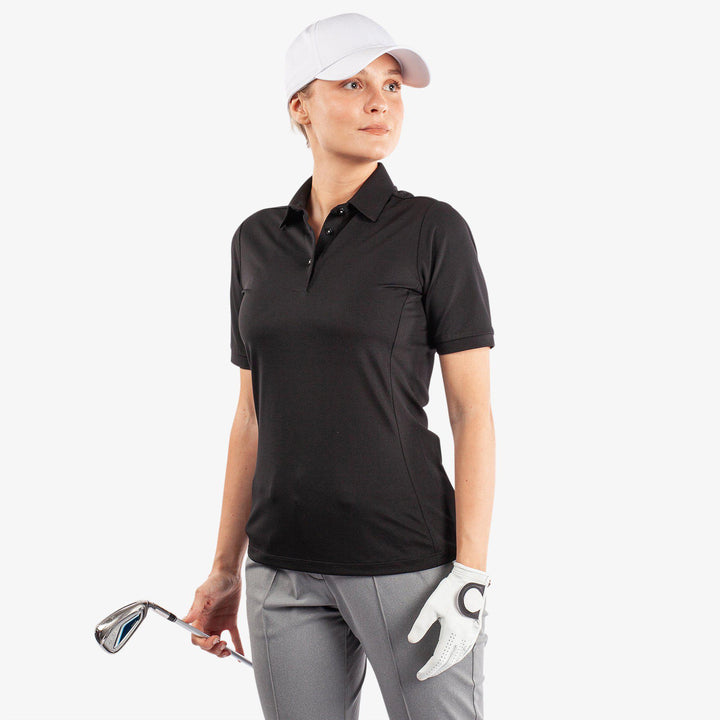 Melody is a Breathable short sleeve golf shirt for Women in the color Black(1)